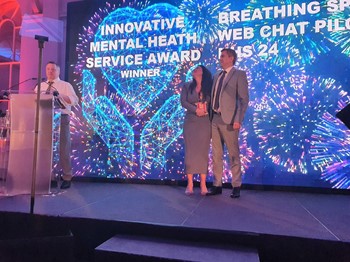 Three of the Breathing Space team at the award ceremony.