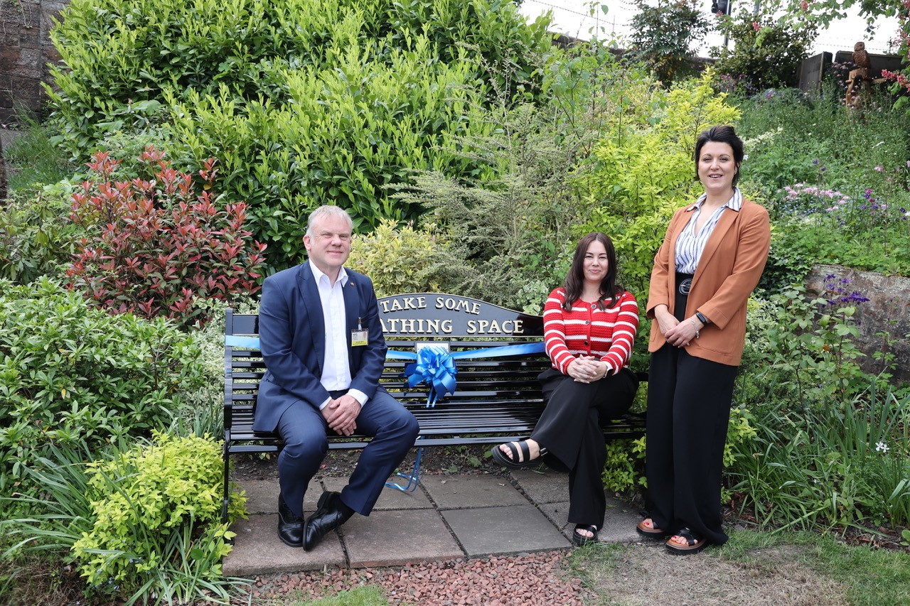 photo of the opening of the new Breathing Space bench at Dumfries train station