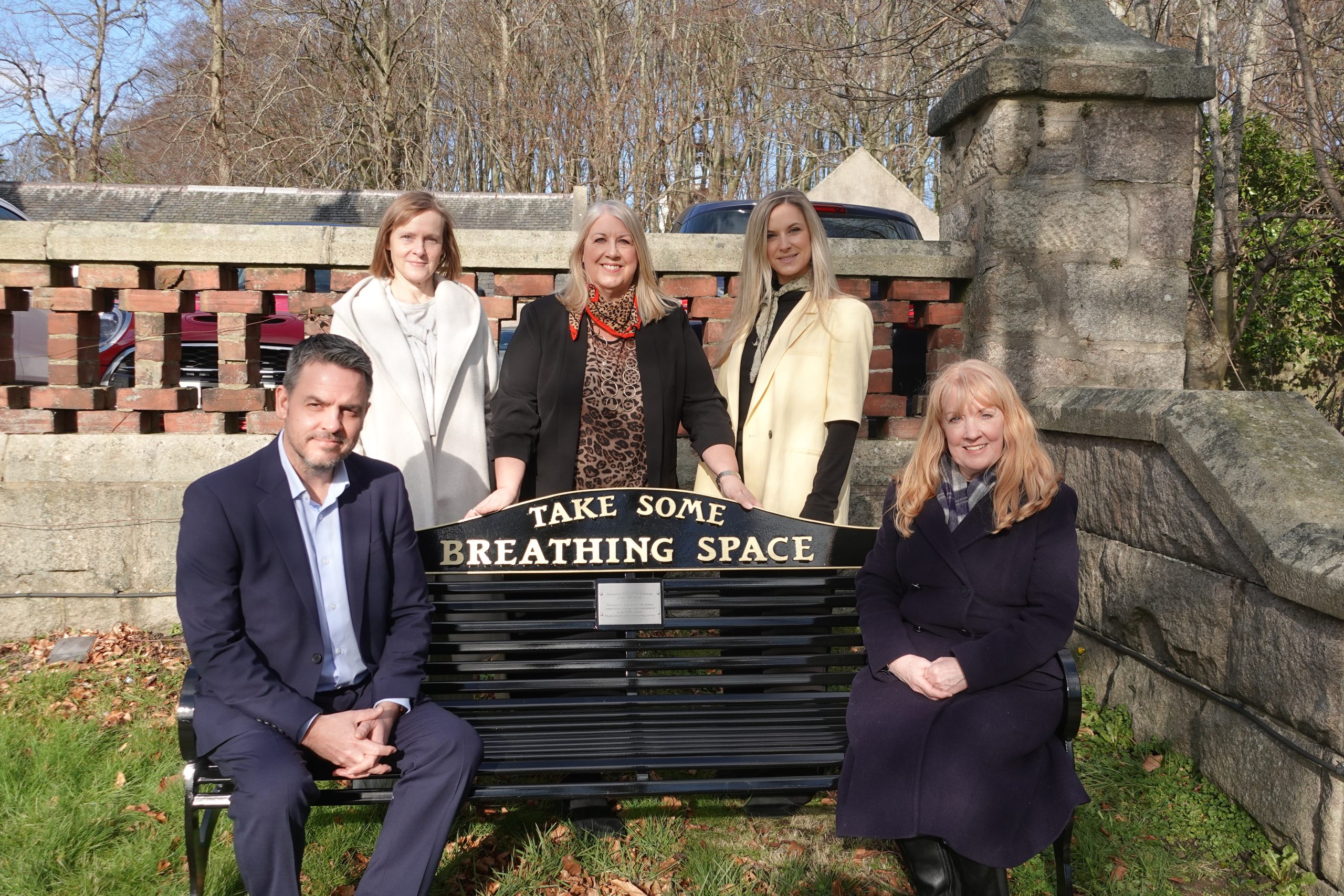 Photo of the unveiling on the new bench in Grampian.
